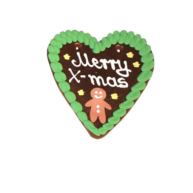 Lebkuchenherz mit grüner Zuckerglasur, Lebkuchenmännchen sowie gelben Sternen und dem Text „Merry X-mas“.