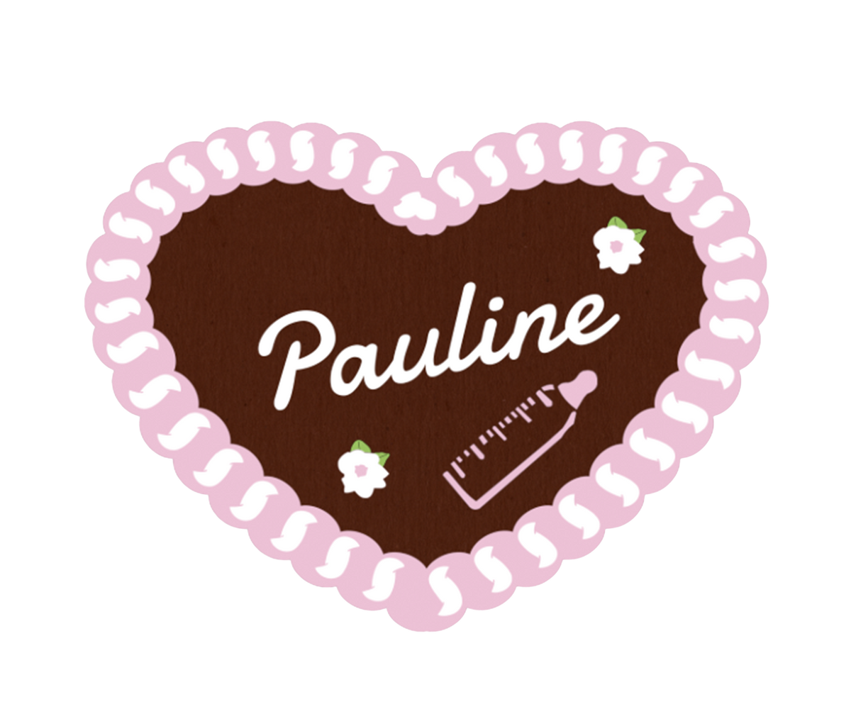 BraunesLebkuchenherz mit Namen Pauline, mit rosa Zuckerrand und Babyflaschen Motiv.